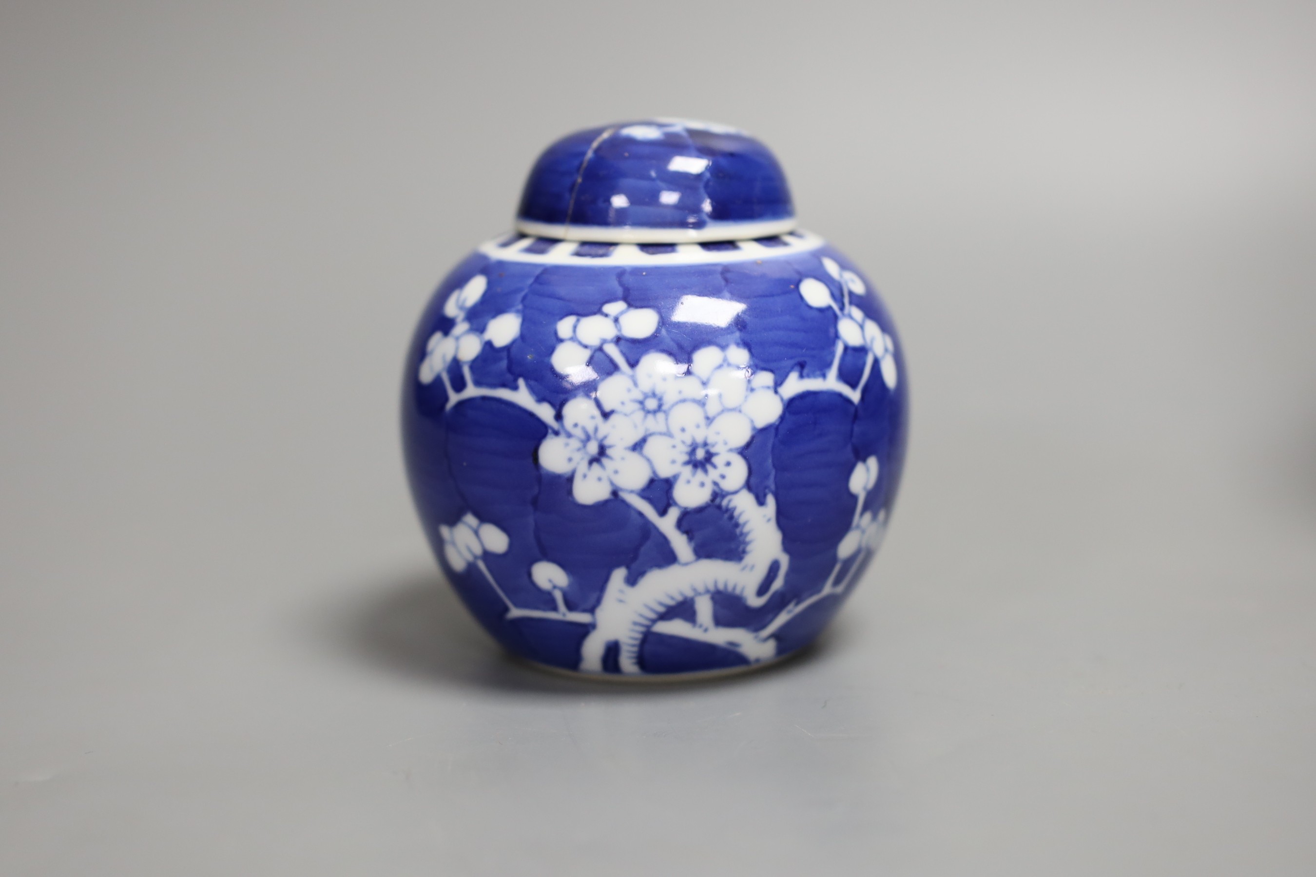Three Chinese blue and white prunus blossom jars, tallest 17cm